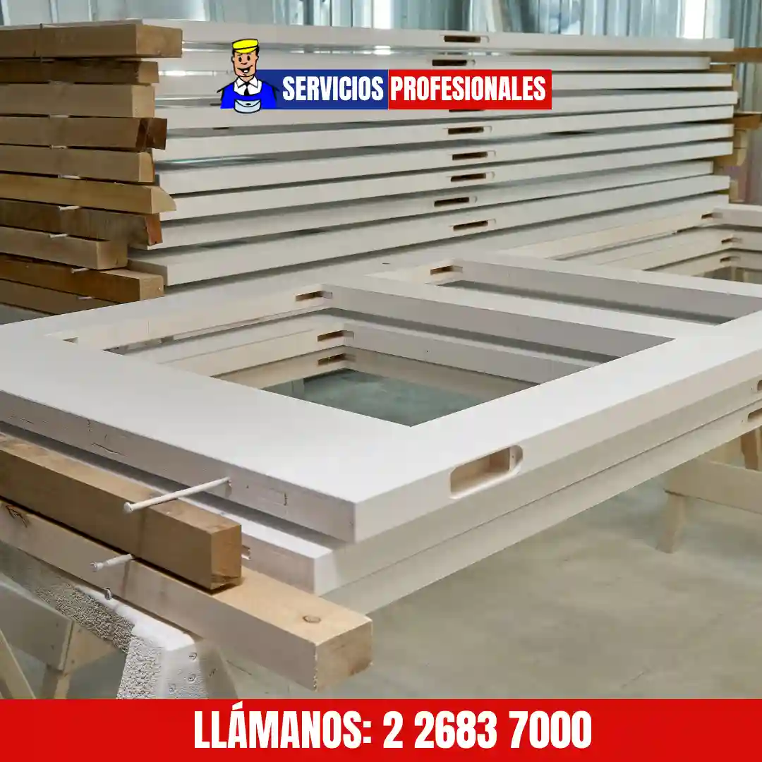 Carpintería en puertas de acceso y portones